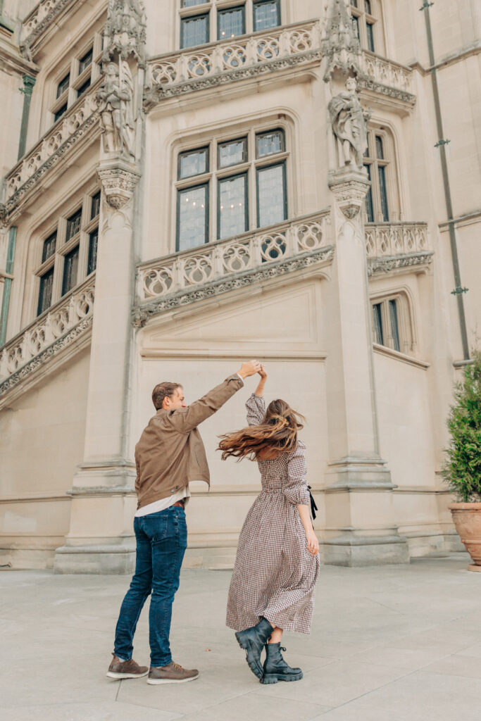 Couples family session with golden retriever dog at the Biltmore Estate at Christmas in Asheville, NC with Rachel Marie Photography