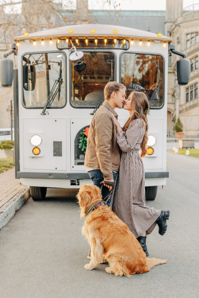 Couples family session with golden retriever dog at the Biltmore Estate at Christmas in Asheville, NC with Rachel Marie Photography