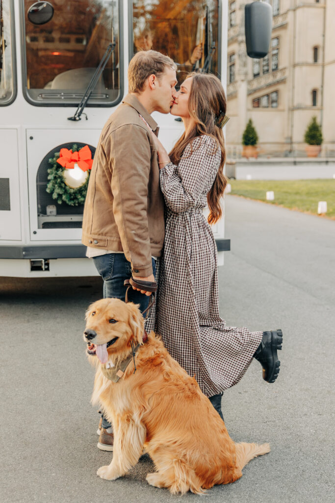 Couples family session with golden retriever dog at the Biltmore Estate at Christmas in Asheville, NC with Rachel Marie Photography