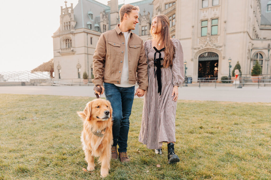 Couples family session with golden retriever dog at the Biltmore Estate at Christmas in Asheville, NC with Rachel Marie Photography