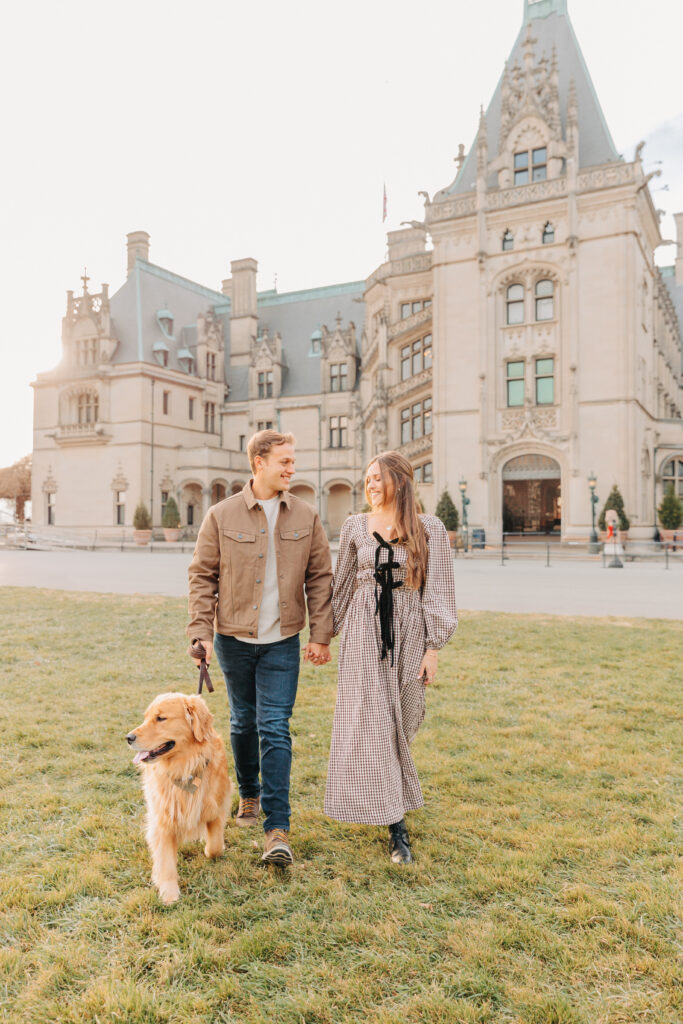 Couples family session with golden retriever dog at the Biltmore Estate at Christmas in Asheville, NC with Rachel Marie Photography