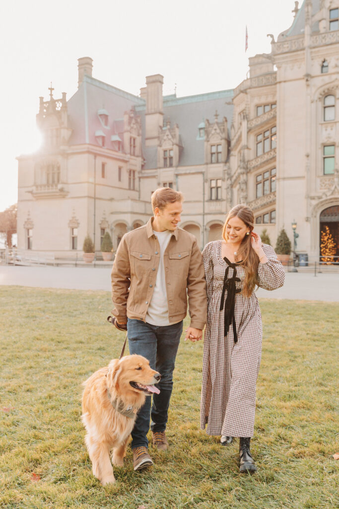 Couples family session with golden retriever dog at the Biltmore Estate at Christmas in Asheville, NC with Rachel Marie Photography