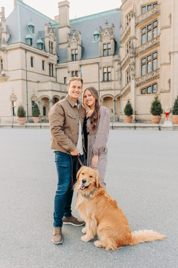 Couples family session with golden retriever dog at the Biltmore Estate at Christmas in Asheville, NC with Rachel Marie Photography