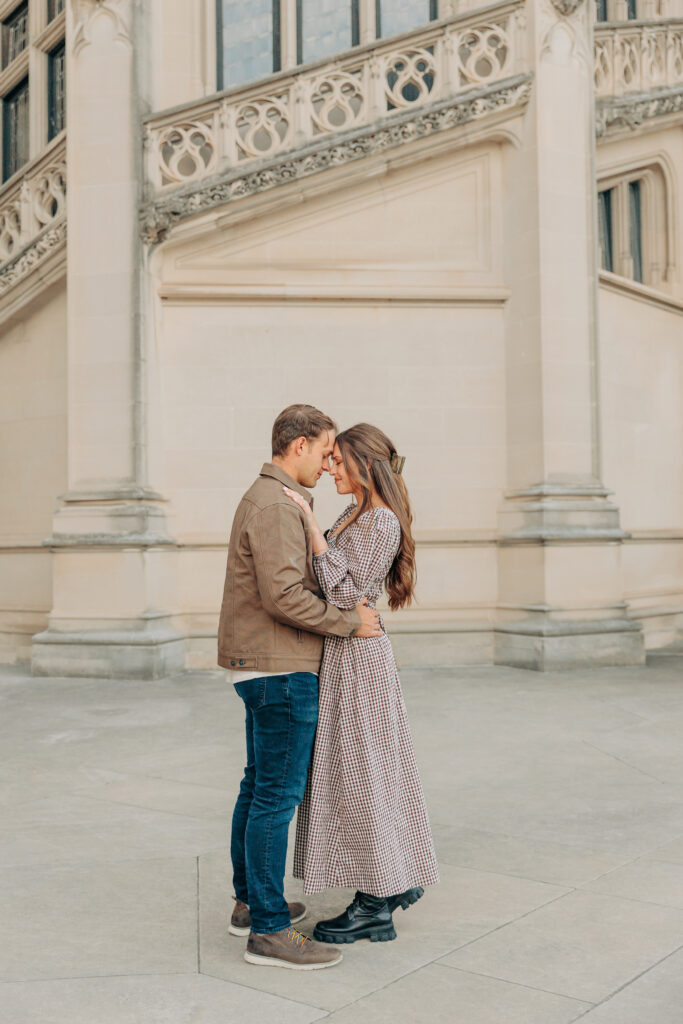 Couples family session with golden retriever dog at the Biltmore Estate at Christmas in Asheville, NC with Rachel Marie Photography