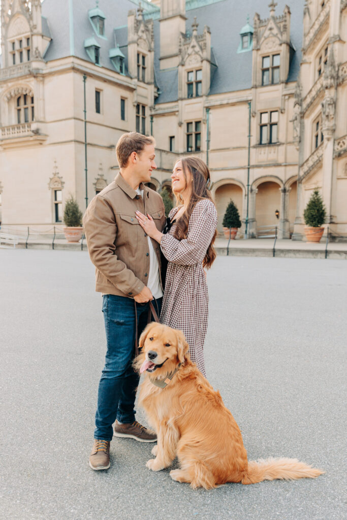 Couples family session with golden retriever dog at the Biltmore Estate at Christmas in Asheville, NC with Rachel Marie Photography