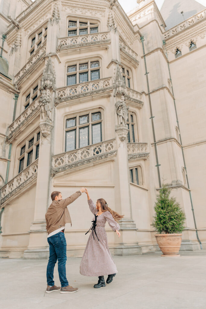 Couples family session with golden retriever dog at the Biltmore Estate at Christmas in Asheville, NC with Rachel Marie Photography