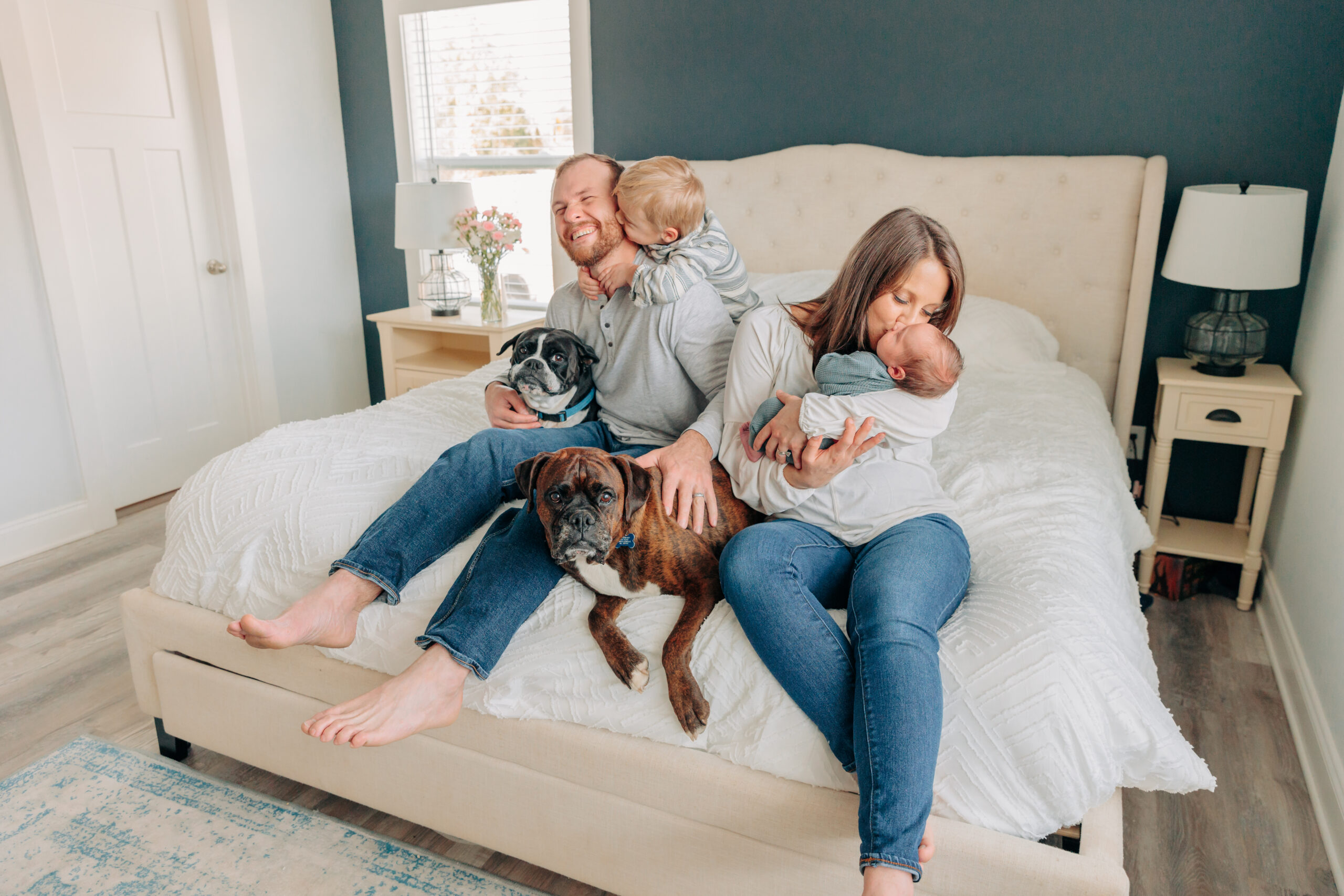 Asheville Newborn Photographer in-home photo session for family with a toddler and dogs in Hendersonville, NC