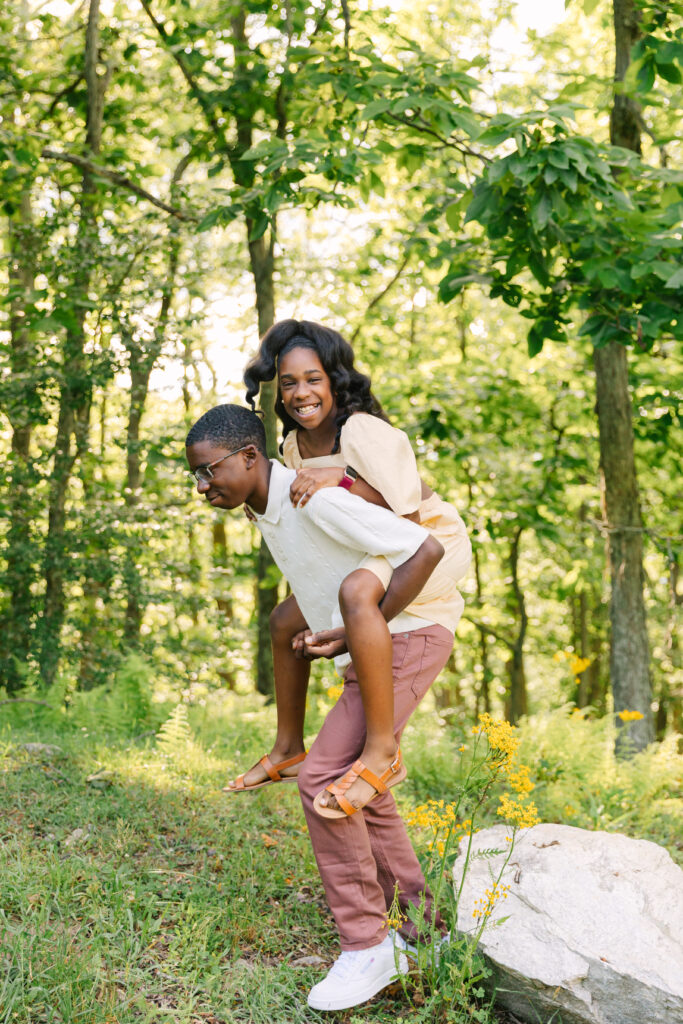 sunset mountain view family adventure photo session at Bear Wallow Mountain in Hendersonville, NC with family with two teenagers