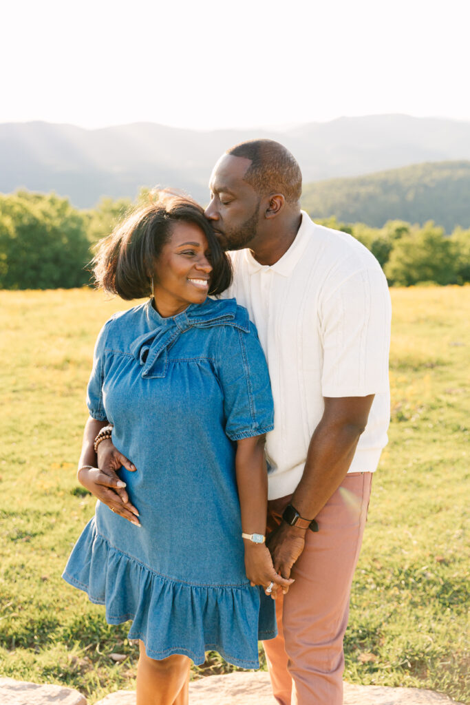 sunset mountain view family adventure photo session at Bear Wallow Mountain in Hendersonville, NC with family with two teenagers