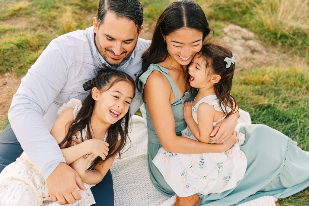 Family and children embracing during photo session at Black Balsam Knob in Asheville, NC.