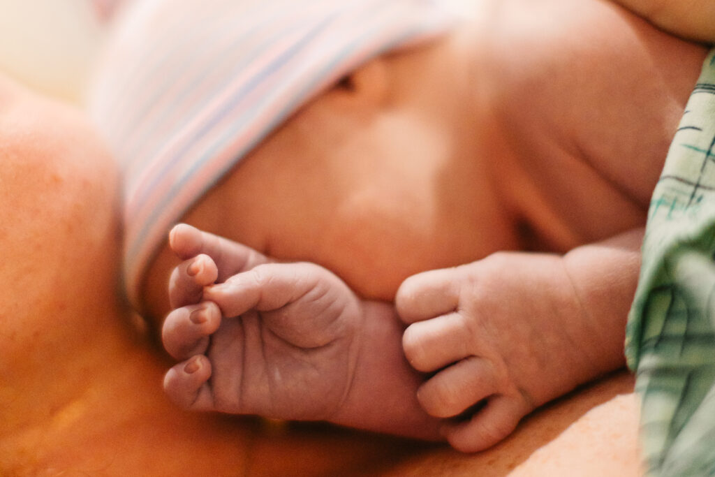 tiny newborn hands just after birth at Mission Hospital in Asheville, NC