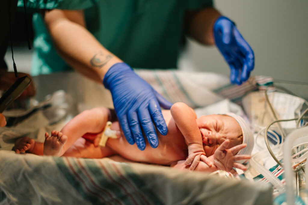 newborn baby boy is weighed and measured at mission hospital in Asheville, NC