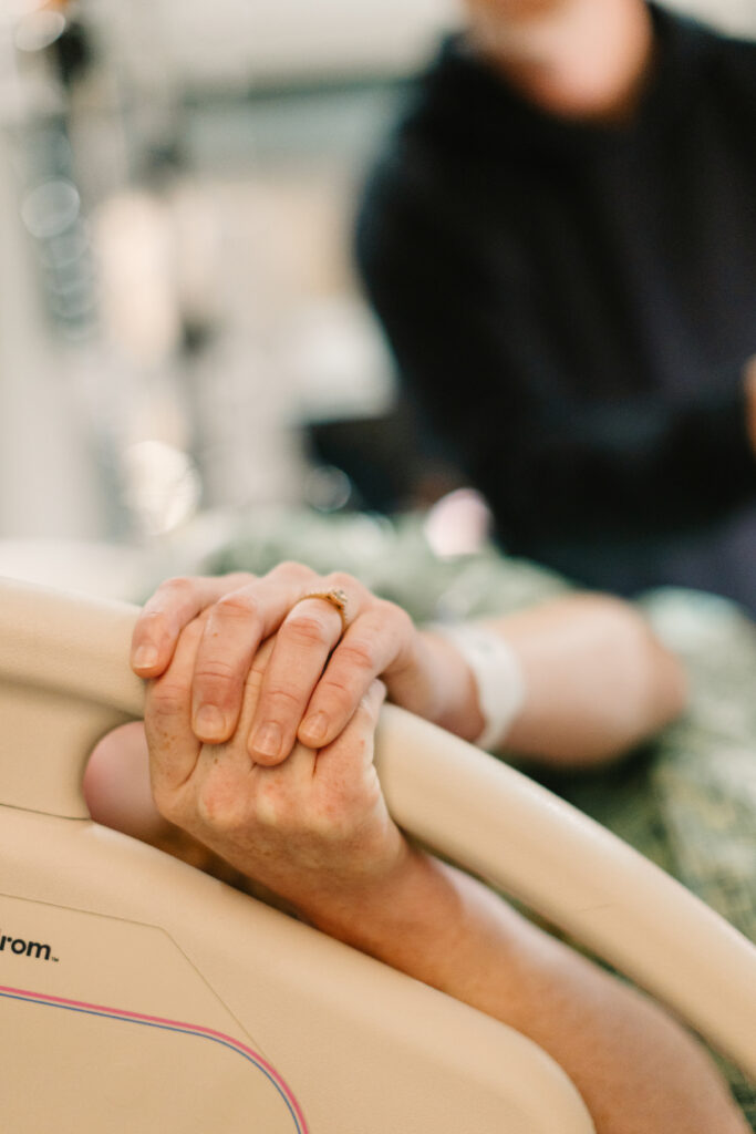 pregnant mother in labor at mission hospital in Asheville, NC during birth photography session with Rachel Marie Photography