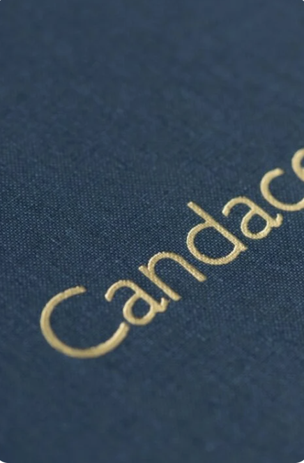 Sample photo album embossment for family's to choose as their photo album title for their newborn photography session with asheville newborn photographer, Rachel Marie Photography